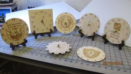 طرح ساعت‌های چوبی برش لیزری حکاکی شده با لوگوهای - laser cut engraved wooden clocks with logos ve - برای دستگاه CNC چوب و لیزر (سی ان سی)