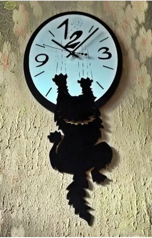 طرح laser-cut-cat-clock-ve