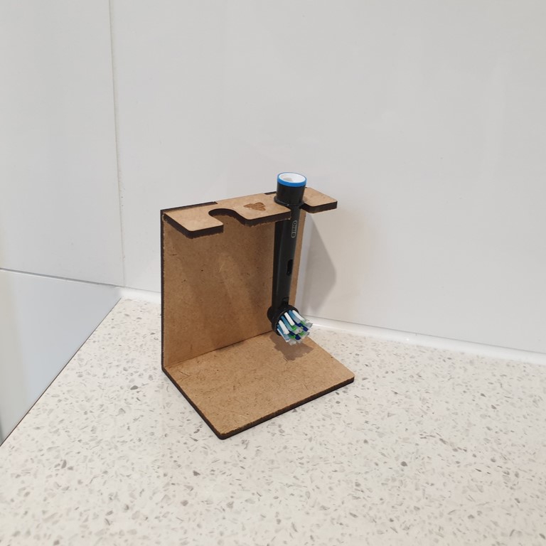 طرح جا مسواک برقی مناسب برای استفاده در دستگاه های cnc چوب و cnc لیزر - laser cut electric toothbrush head holder svg file