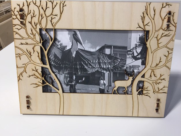 طرح قاب عکس گوزن مناسب برای استفاده در دستگاه های cnc چوب و cnc لیزر - laser cut deer photo frame template cdr file
