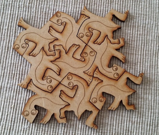 طرح مارمولک اشر مناسب برای استفاده در دستگاه های cnc چوب و cnc لیزر - laser cut escher lizards geckos cdr file
