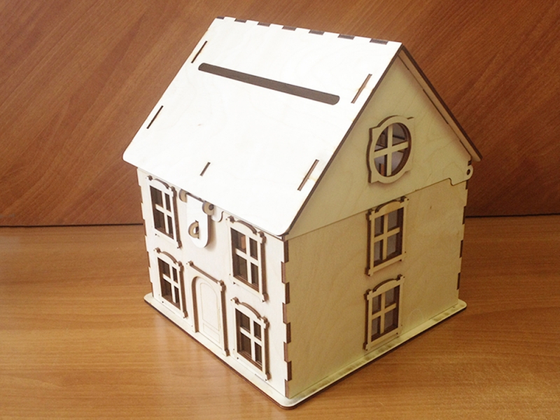 طرح خانه چوبی به شکل قلک مناسب برای استفاده در دستگاه های cnc چوب و cnc لیزر - laser cut wooden house shaped piggy bank cdr file