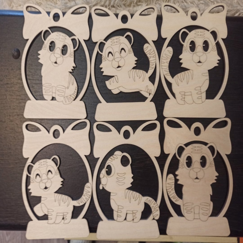 طرح ببر چوبی کریسمس مناسب برای استفاده در دستگاه های cnc چوب و cnc لیزر - laser cut wooden tiger christmas ornaments cdr file