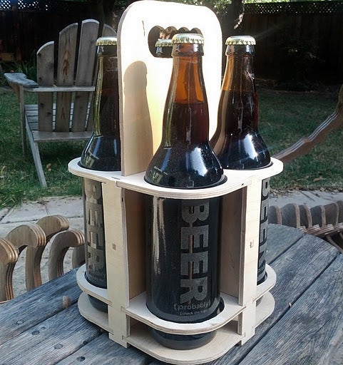 طرح جعبه حمل نوشابه و قابل ویرایش مناسب برای استفاده در دستگاه های cnc چوب و cnc لیزر - laser cut 4 pack beer carrier beer caddy bottle holder svg file