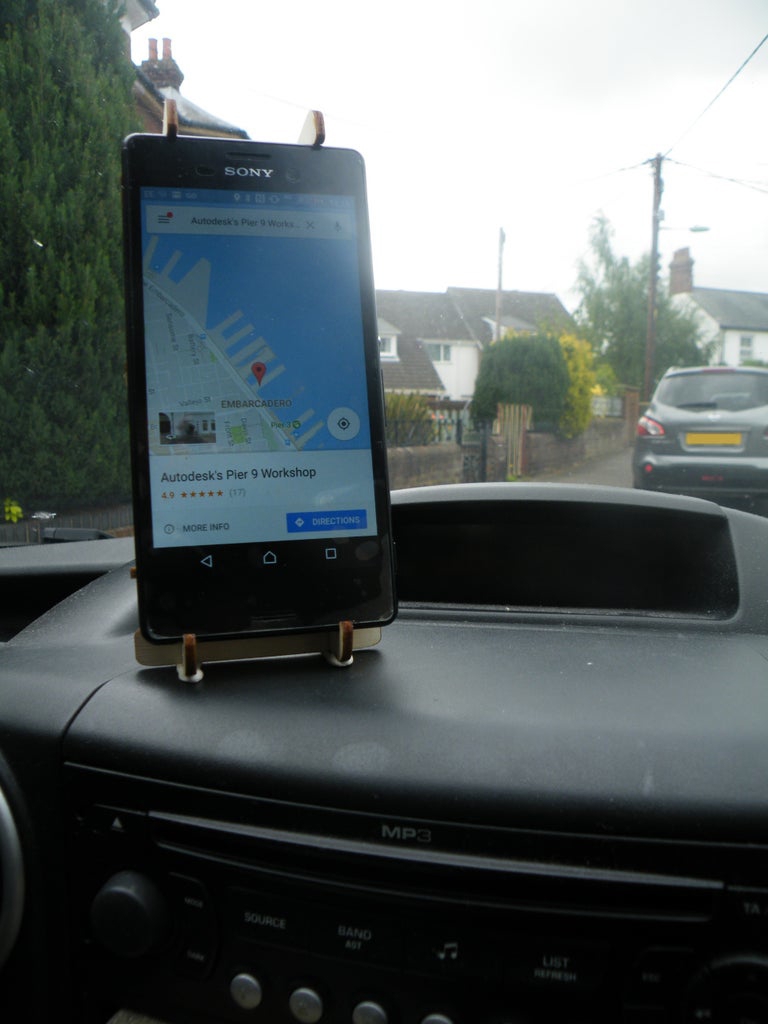 طرح پایه گوشی داشبوردی مناسب برای استفاده در دستگاه های cnc چوب و cnc لیزر - laser cut dashboard phone stand cdr file