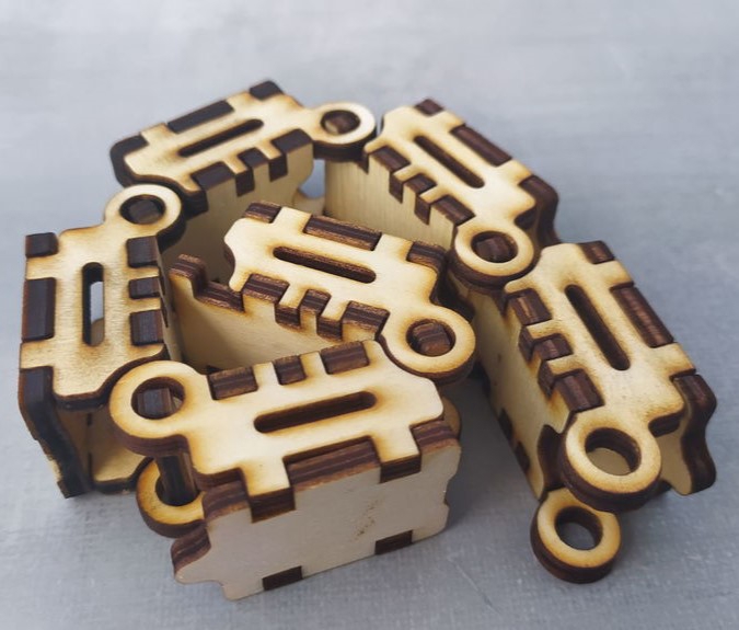 طرح زنجیر چوبی مناسب برای استفاده در دستگاه های cnc چوب و cnc لیزر - laser cut wooden drag chain dxf file