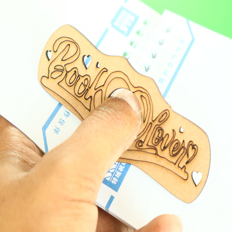 طرح جا انگشتی کتاب مناسب برای استفاده در دستگاه های cnc چوب و cnc لیزر - laser cut book page thumb holder cdr file