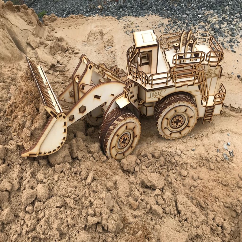 طرح پازل سه بعدی لودر کاترپیلار ۹۹۴ مناسب برای استفاده در دستگاه های cnc چوب و cnc لیزر - laser cut caterpillar 994 wheel loader 3d puzzle cdr file
