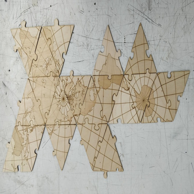 طرح نقشه جهان طرح دایمکسیون مناسب برای استفاده در دستگاه های cnc چوب و cnc لیزر - laser cut dymaxion world map dxf file
