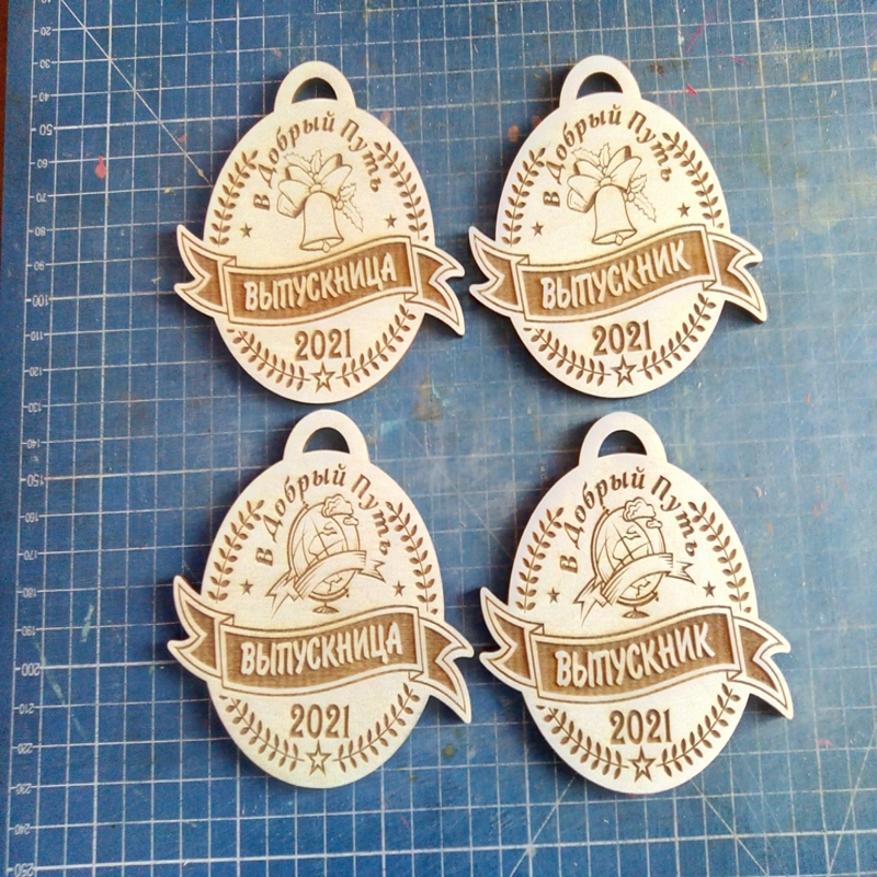 طرح مدال های مدرسه حکاکی شده با لیزر، مناسب برای استفاده در دستگاه های cnc چوب و cnc لیزر - laser cut engraved school kids medals cdr file