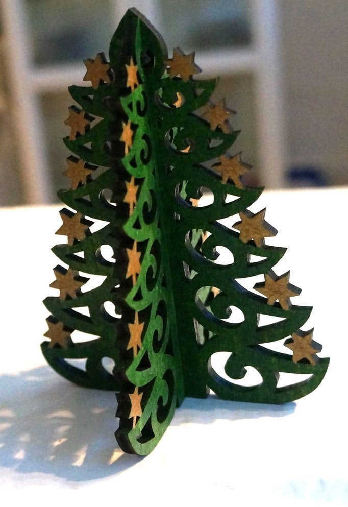 طرح درخت کریسمس سال نو مناسب برای استفاده در دستگاه های cnc چوب و cnc لیزر - laser cut christmas tree new year cdr file
