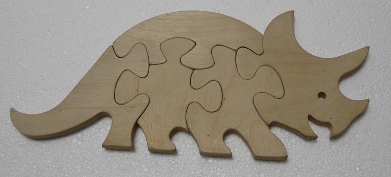 طرح قالب پازل کرگدن مناسب برای استفاده در دستگاه های cnc چوب و cnc لیزر - rhinoceros jigsaw puzzle laser cutting template dxf file