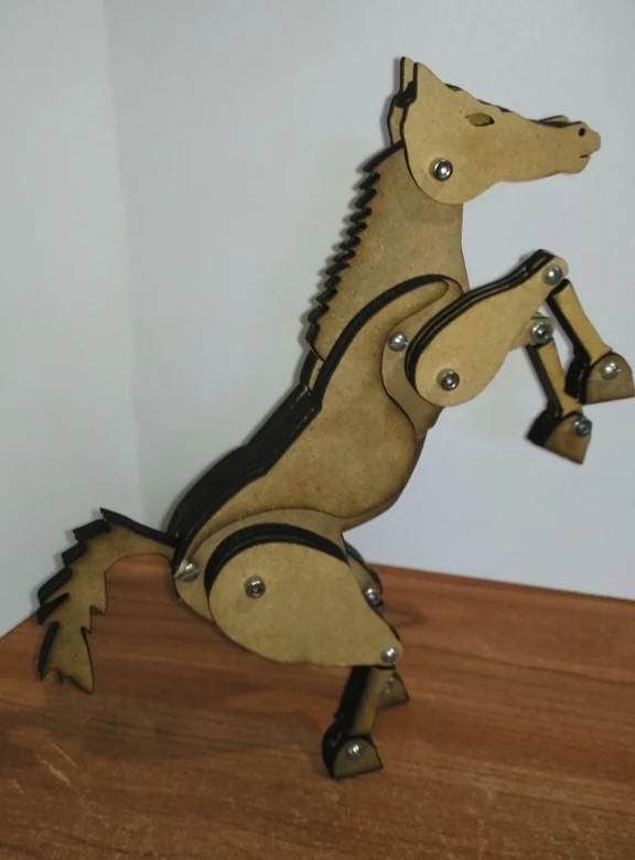 طرح اسب مفصلی مناسب برای استفاده در دستگاه های cnc چوب و cnc لیزر - laser cut articulated horse svg file