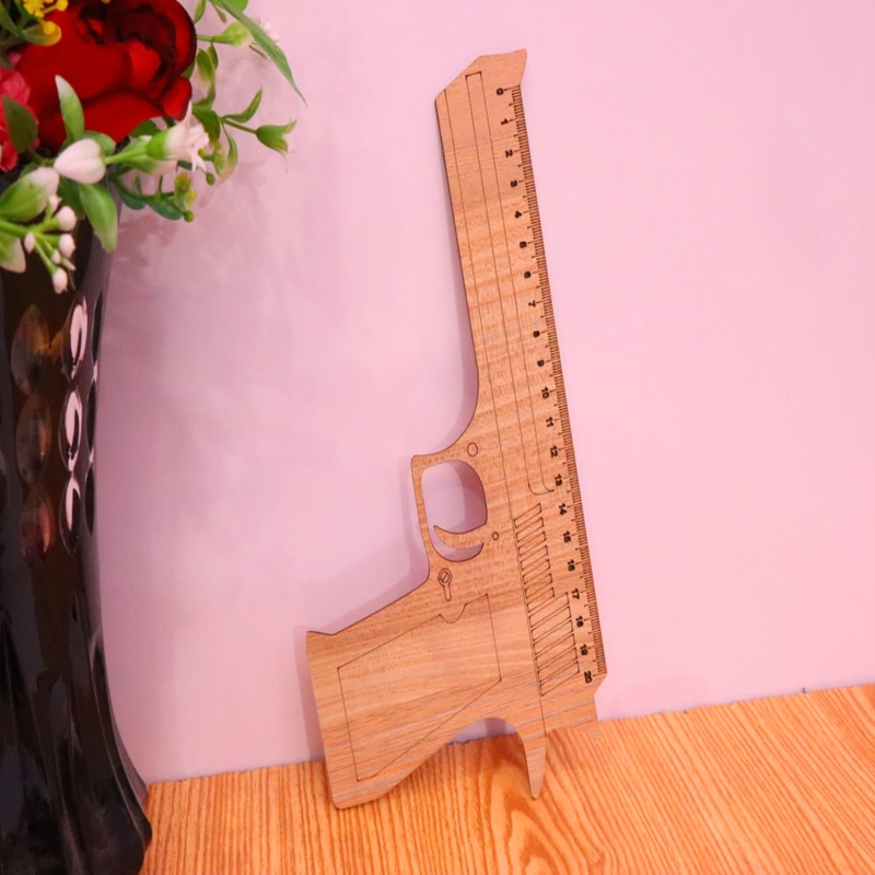 طرح خط کش به شکل تفنگ مناسب برای استفاده در دستگاه های cnc چوب و cnc لیزر - laser cut gun shape ruler dxf file