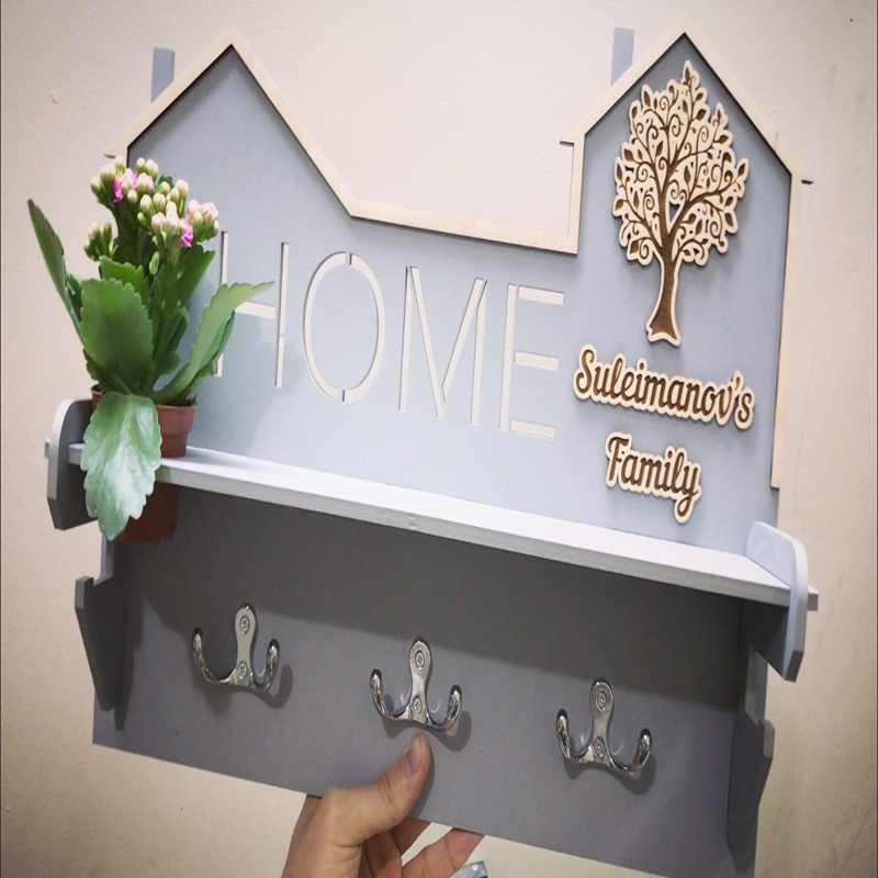 طرح قفسه دیواری چند منظوره جا لباسی به همراه قفسه مخصوص کاشت گیاه مناسب برای استفاده در دستگاه های cnc چوب و cnc لیزر - laser cut multipurpose wall shelf coat rack with planter shelf cdr file