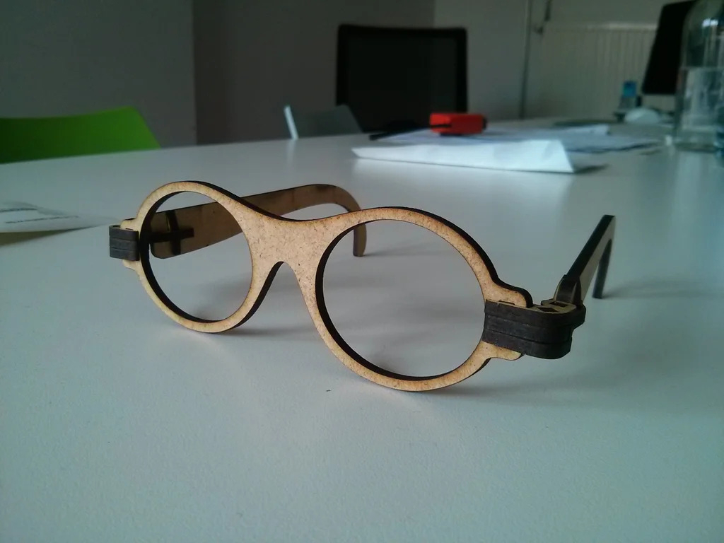 طرح عینک تاشو چوبی مناسب برای استفاده در دستگاه های cnc چوب و cnc لیزر - laser cut wooden foldable glasses svg file