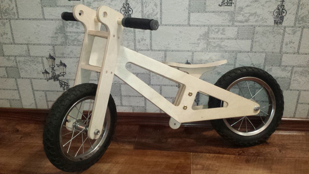 طرح دوچرخه چوبی با روتر cnc، فایل dwg مناسب برای استفاده در دستگاه های cnc چوب و cnc لیزر - wooden balance bike laser cut cnc router template dwg file