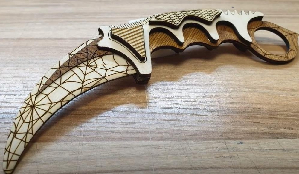 طرح حکاکی لیزری چاقوی کارامبیت با ضخامت ۳ میلی‌متر مناسب برای استفاده در دستگاه های cnc چوب و cnc لیزر - laser cut engraved karambit knife 3mm cdr file