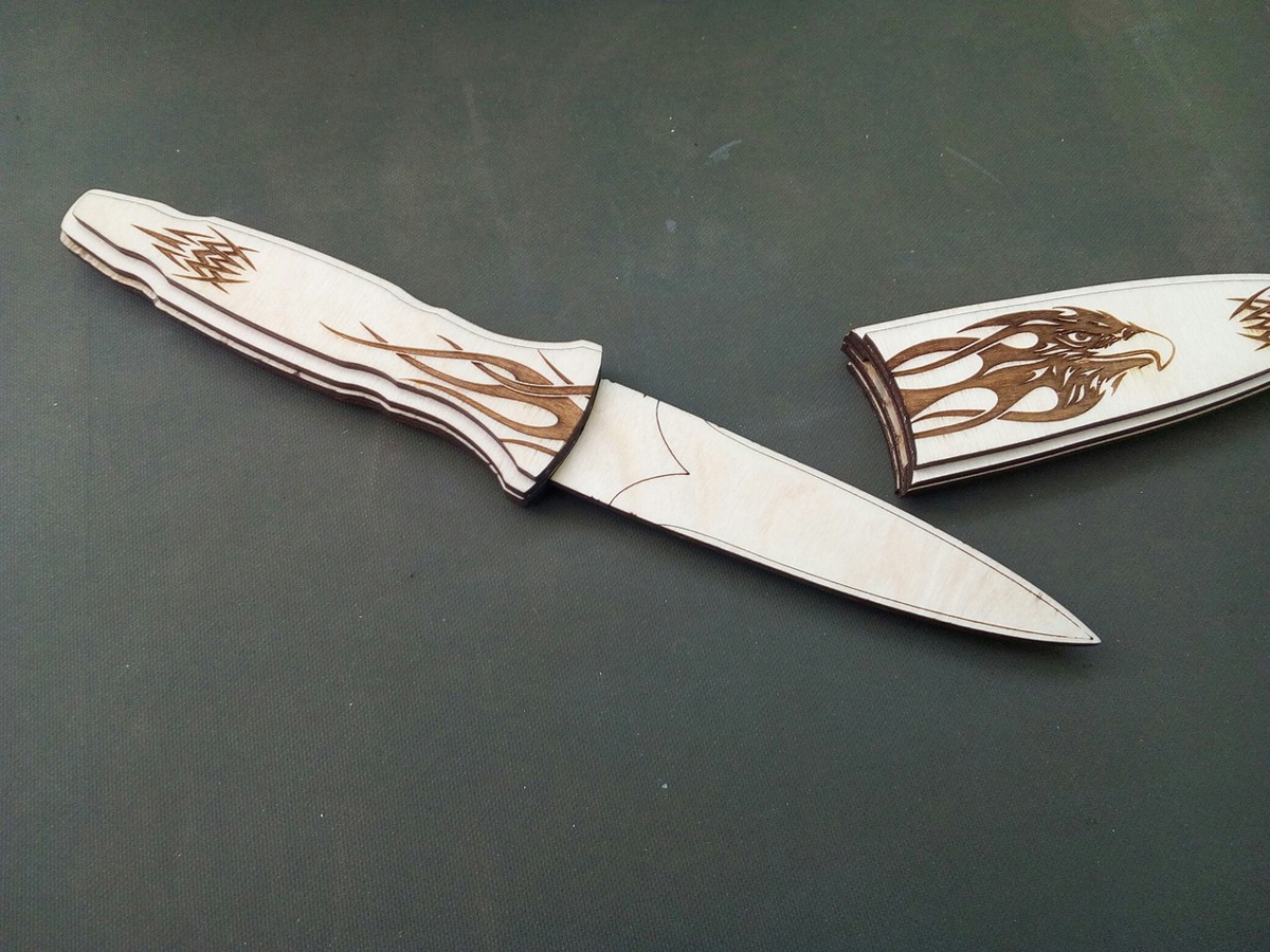 طرح چاقوی با حکاکی مناسب برای استفاده در دستگاه های cnc چوب و cnc لیزر - laser cut knife with engraving cdr file