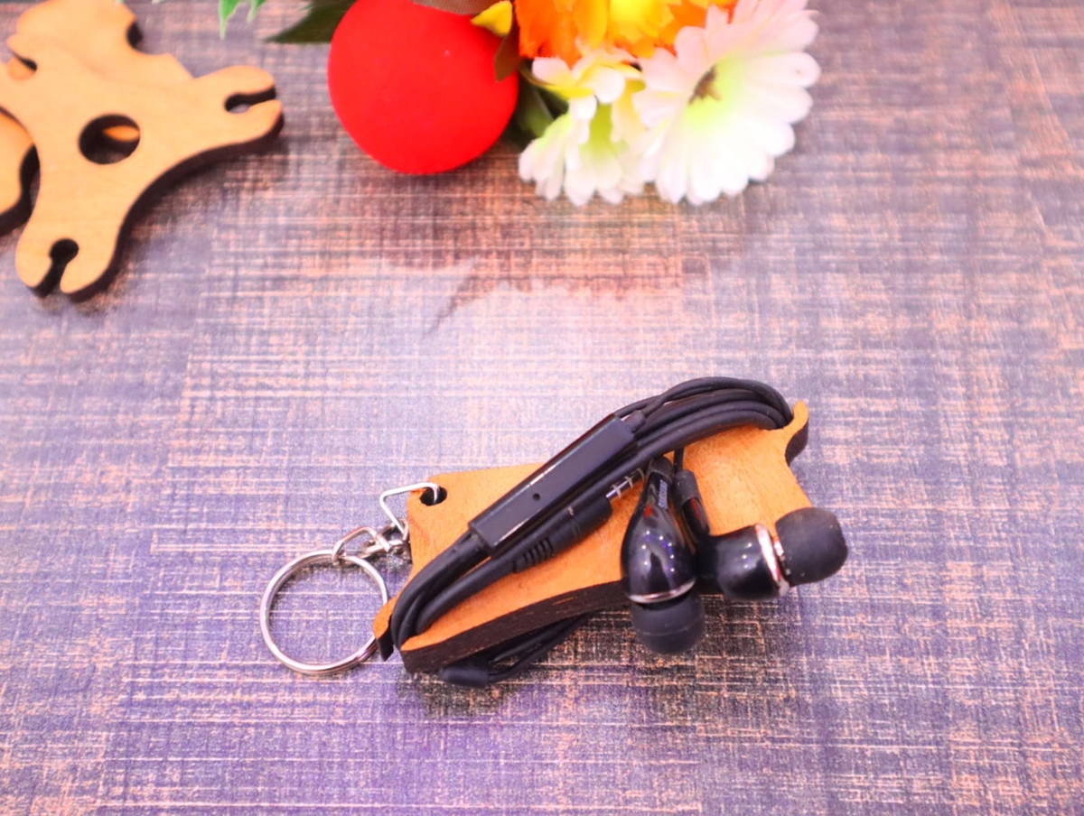 طرح جاکلیدی و بند هدفون مناسب برای استفاده در دستگاه های cnc چوب و cnc لیزر - laser cut earbud cord organizer keychain cdr file