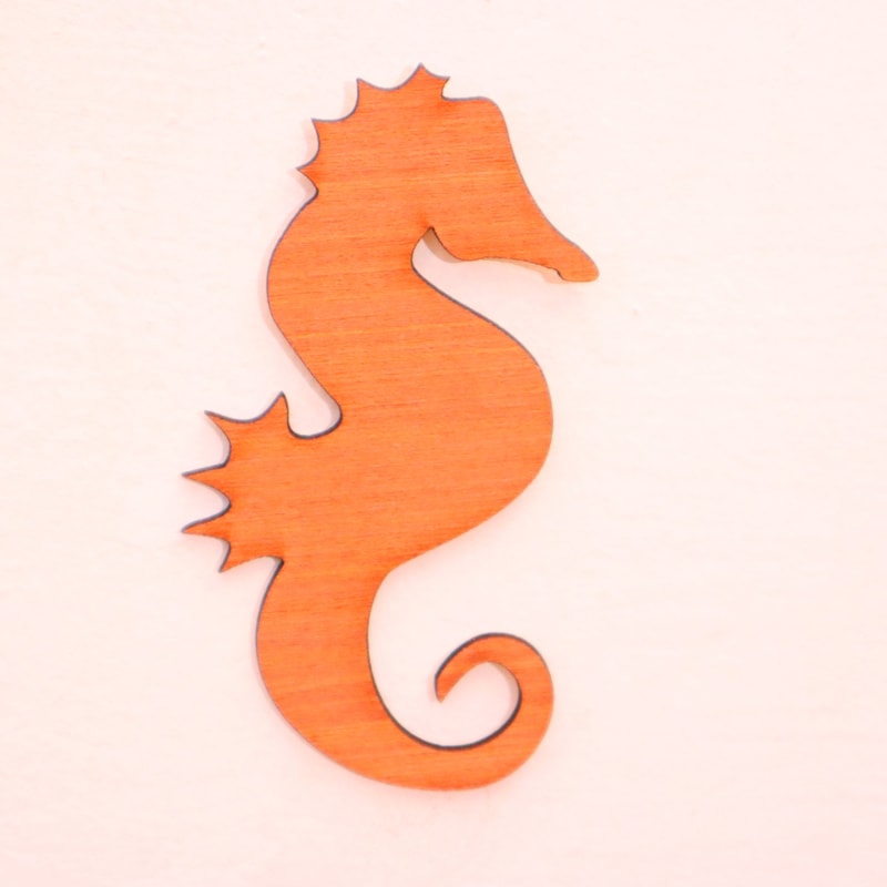 طرح اسب دریایی مناسب برای استفاده در دستگاه های cnc چوب و cnc لیزر - laser cut seahorse shape template cdr file