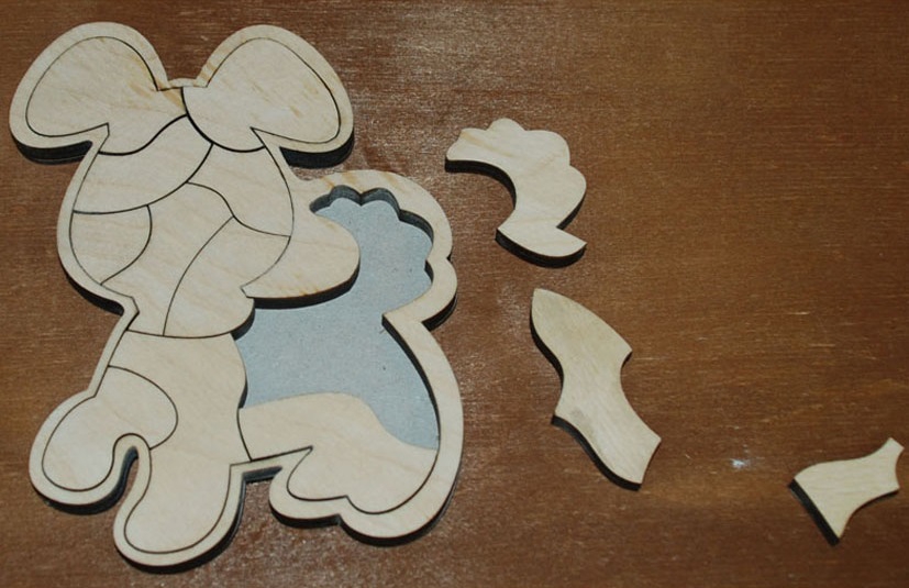 طرح پازل به شکل سگ مناسب برای استفاده در دستگاه های cnc چوب و cnc لیزر - laser cut dog shaped jigsaw puzzle cdr file
