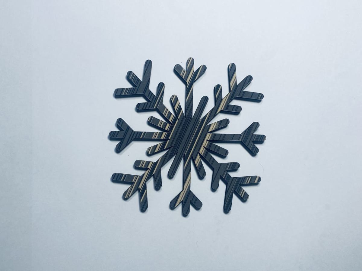 طرح دانه برف طرح چوب ناتمام مناسب برای استفاده در دستگاه های cnc چوب و cnc لیزر - laser cut unfinished wood snowflake cutout craft cdr file