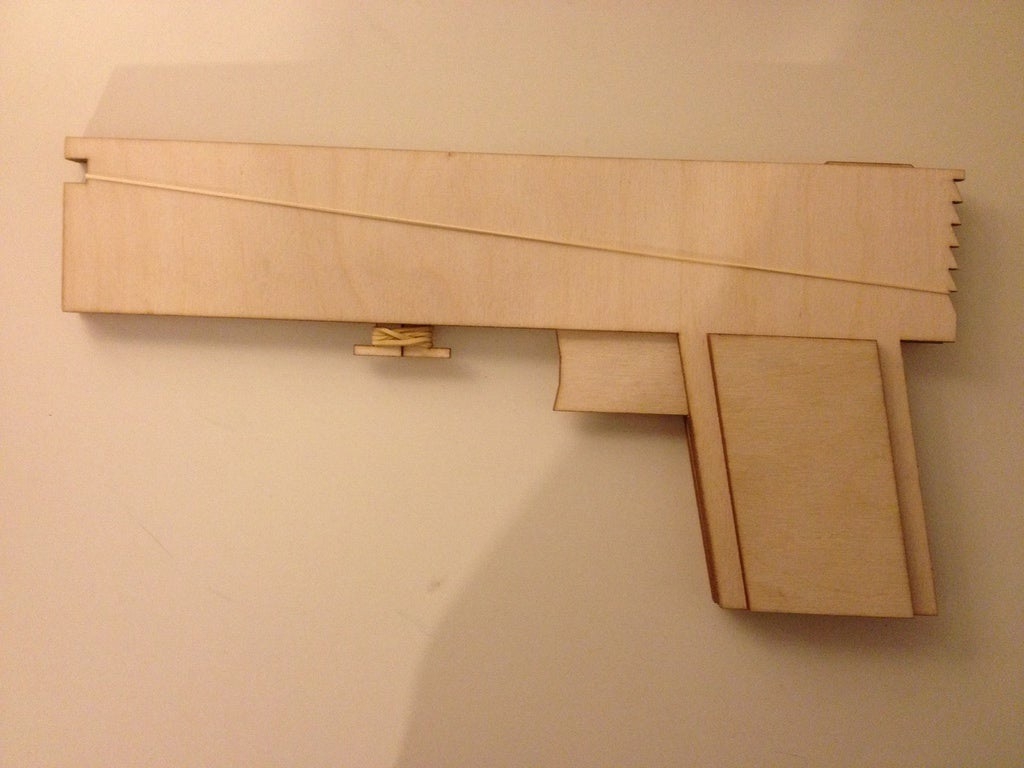 طرح تفنگ لاستیکی ۶ تیر نیمه اتوماتیک مناسب برای استفاده در دستگاه های cnc چوب و cnc لیزر - laser cut rubber band gun 6 shot semi automatic svg file