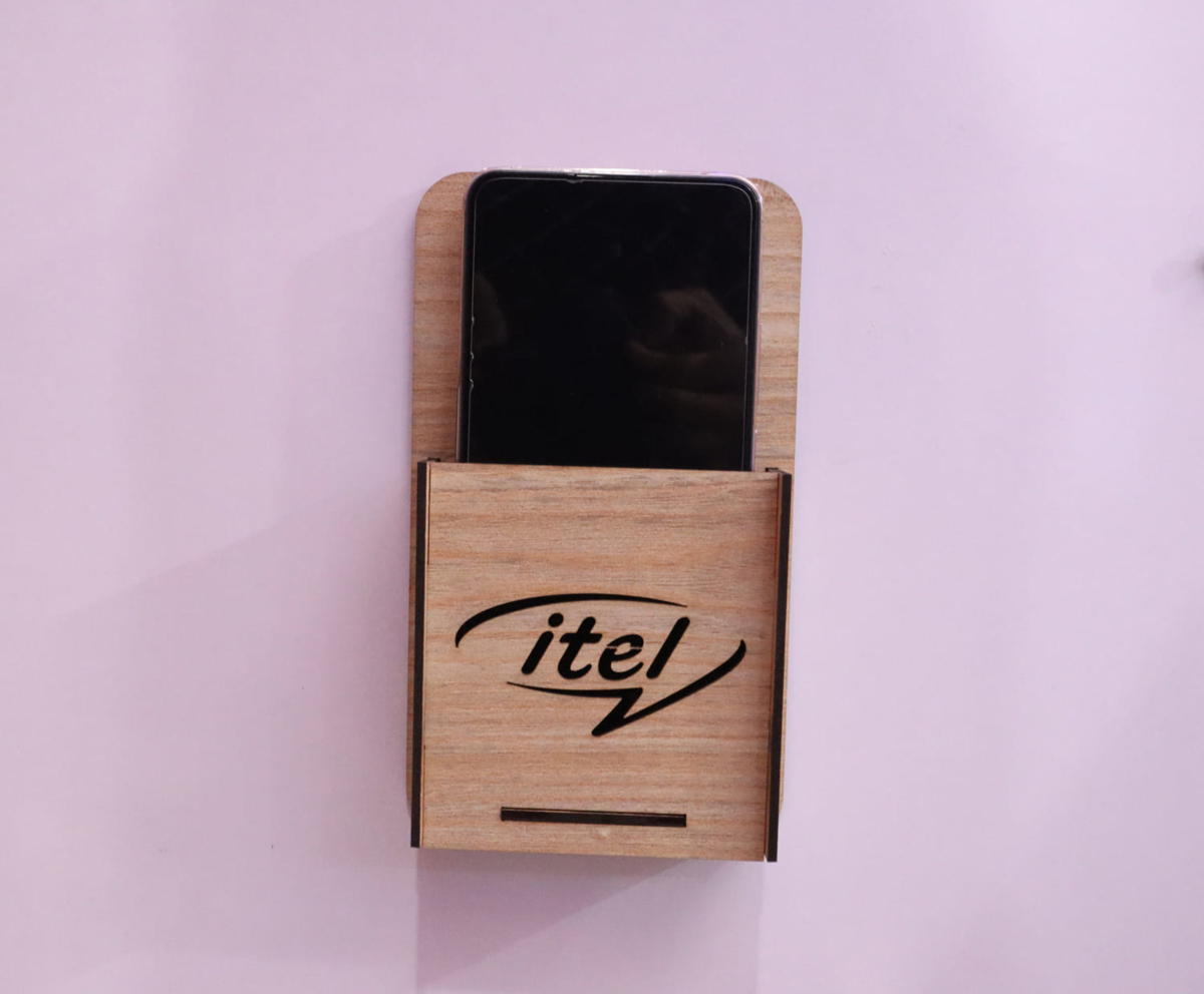 طرح پایه نگهدارنده موبایل دیواری با طرح لوگوی شرکت itel مناسب برای استفاده در دستگاه های cnc چوب و cnc لیزر - laser cut wall mounted mobile holder with itel logo cdr file