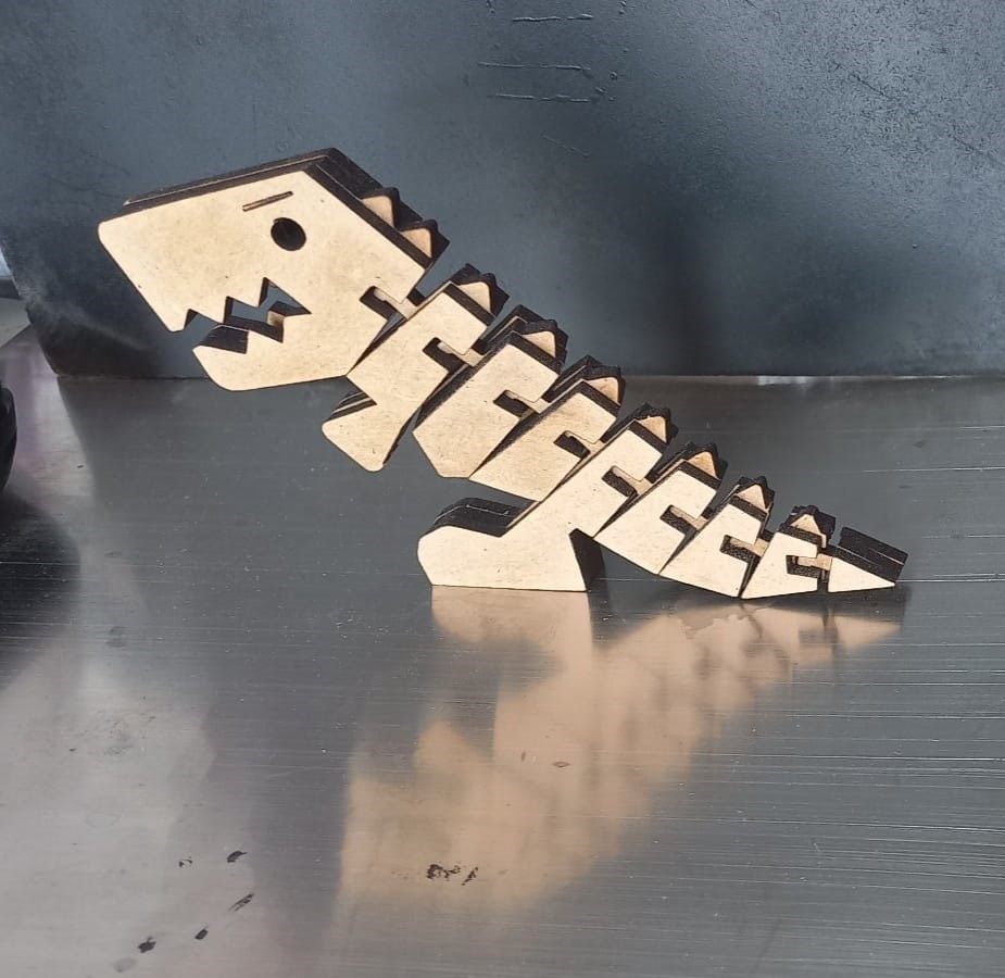 طرح اسباب بازی چوبی حیوانات فلکسی رکس مناسب برای استفاده در دستگاه های cnc چوب و cnc لیزر - laser cut flexi rex bendable wooden animal toys cdr file