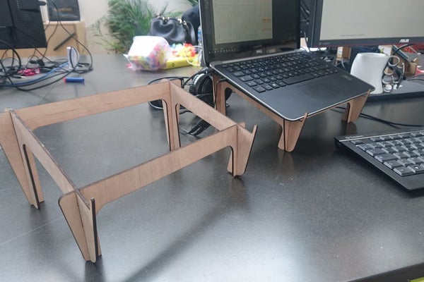 طرح پایه لپ تاپ چوبی مناسب برای استفاده در دستگاه های cnc چوب و cnc لیزر - laser cut wooden laptop stand ai file