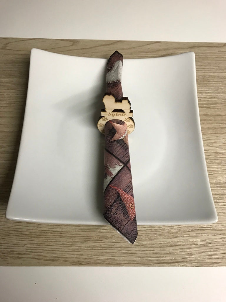 طرح حلقه دستمال سفره سگ مناسب برای استفاده در دستگاه های cnc چوب و cnc لیزر - laser cut dog napkin ring svg file