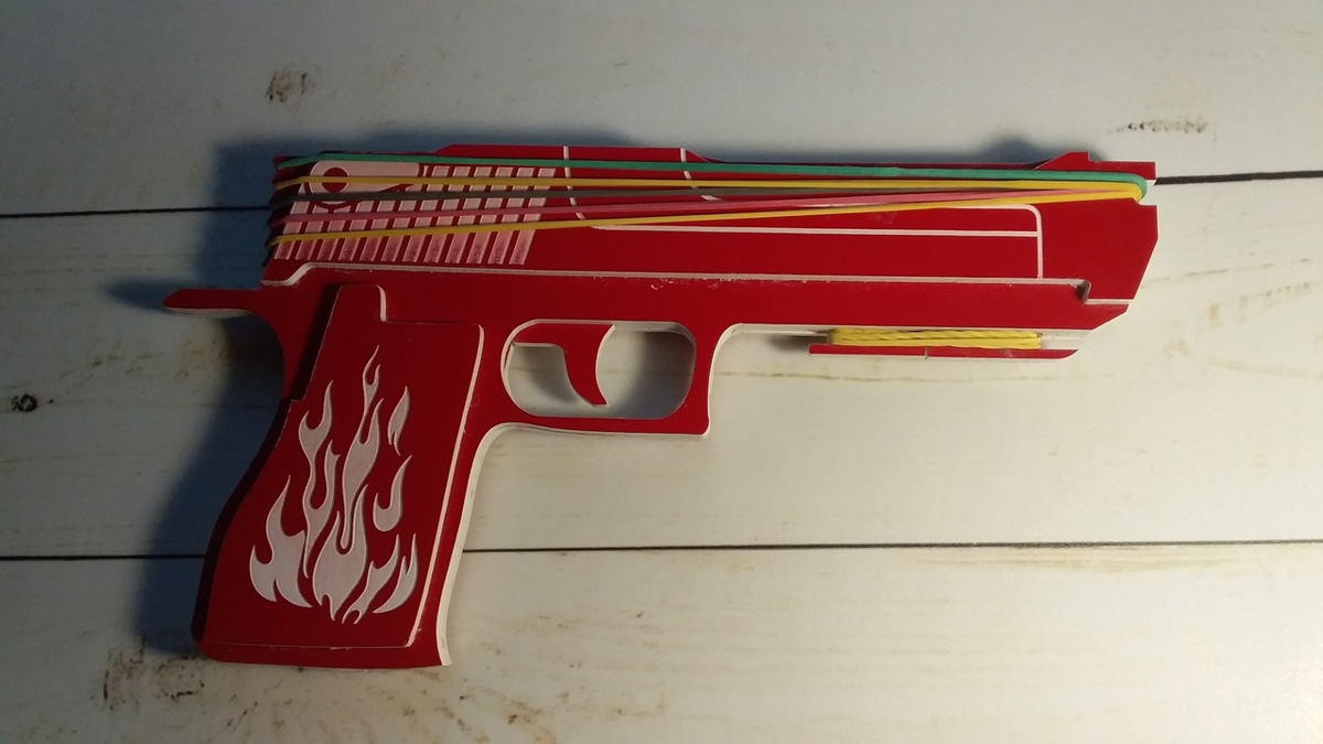 طرح تفنگ با کش چوبی مناسب برای استفاده در دستگاه های cnc چوب و cnc لیزر - laser cut wooden rubber band gun cdr file