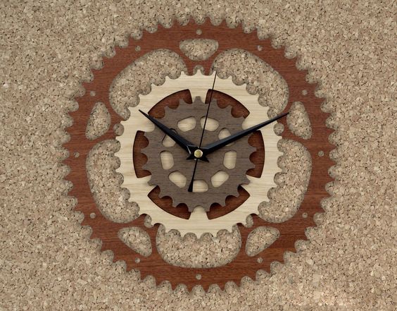 طرح ساعت چرخ دنده مناسب برای استفاده در دستگاه های cnc چوب و cnc لیزر - laser cut gear clock cdr file