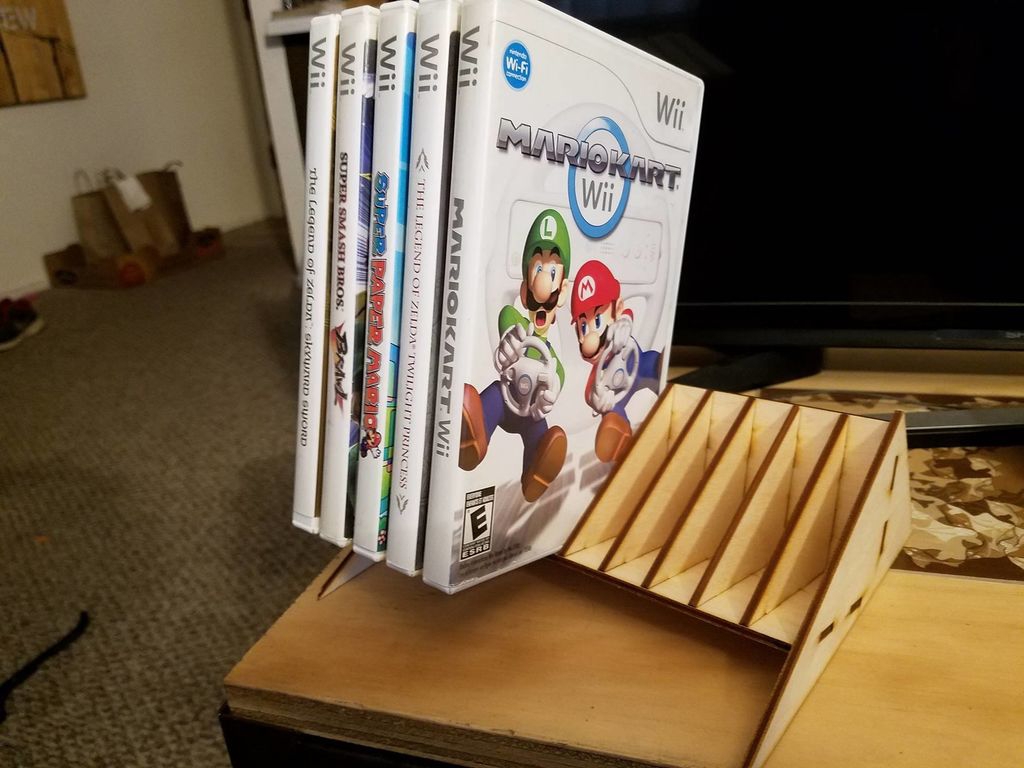 طرح جا بازی ویدیویی مناسب برای استفاده در دستگاه های cnc چوب و cnc لیزر - laser cut video game holder dxf file