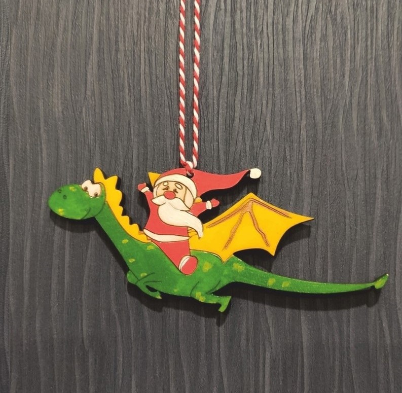 طرح بابانوئل سوار بر اژدها مناسب برای استفاده در دستگاه های cnc چوب و cnc لیزر - laser cut santa claus riding dragon ornament cdr file