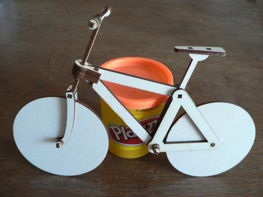 طرح دوچرخه چوبی فلت پک مناسب برای استفاده در دستگاه های cnc چوب و cnc لیزر - laser cut flatpack wooden bike cdr file