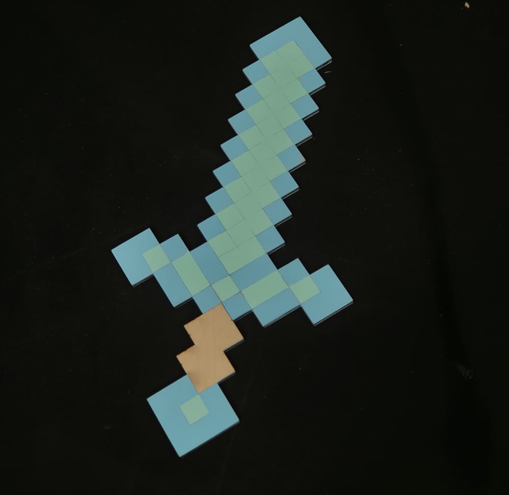 طرح شمشیر پیکسلی ماینکرفت به صورت مناسب برای استفاده در دستگاه های cnc چوب و cnc لیزر - laser cut minecraft pixel sword cdr file