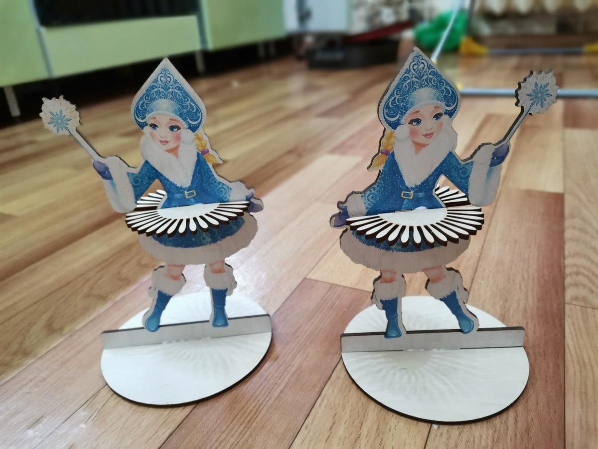 طرح جا دستمال سفره دختر برفی مناسب برای استفاده در دستگاه های cnc چوب و cnc لیزر - laser cut napkin holder snow maiden cdr file