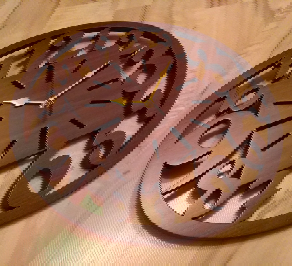 طرح ساعت دیواری چوبی منحصر به فرد مناسب برای استفاده در دستگاه های cnc چوب و cnc لیزر - laser cut unique wooden wall clock cdr file