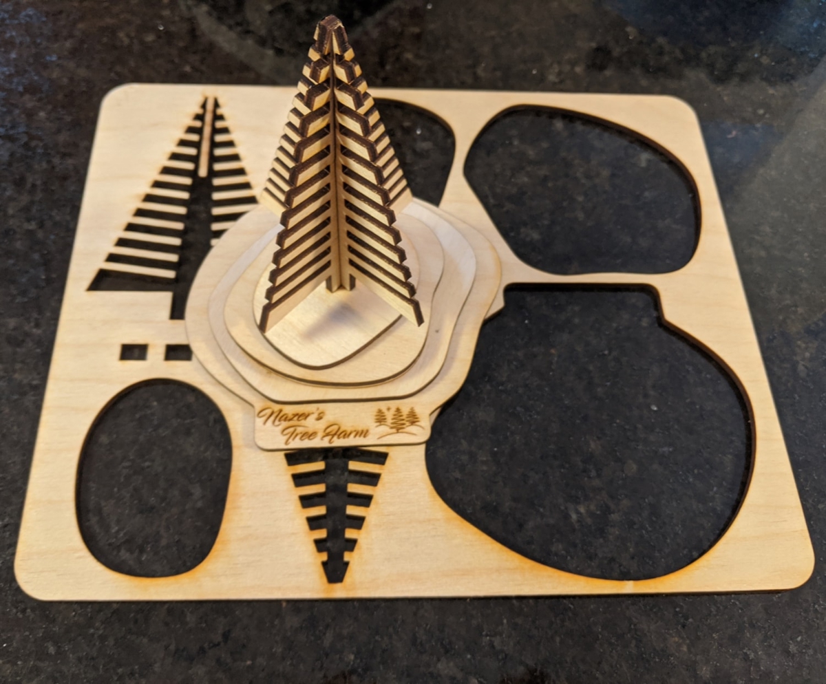 طرح روی میز درخت کریسمس مناسب برای استفاده در دستگاه های cnc چوب و cnc لیزر - laser cut table top christmas tree svg file