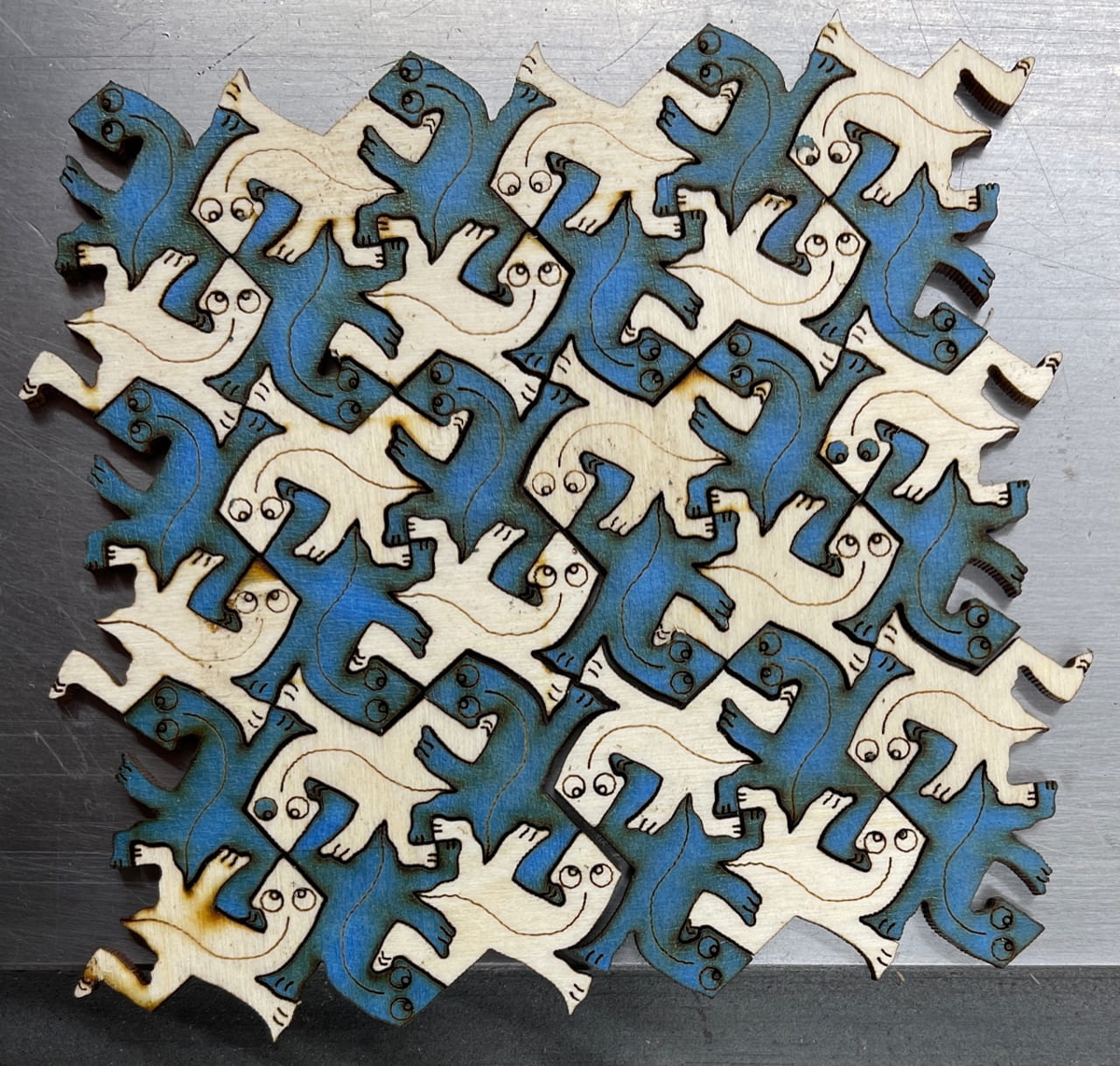 طرح مارمولک اشر مناسب برای استفاده در دستگاه های cnc چوب و cnc لیزر - laser cut escher lizards dxf file