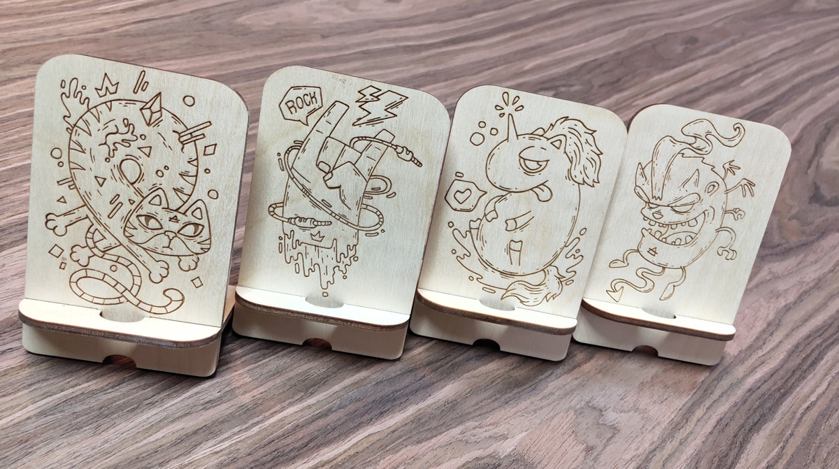 طرح پایه‌های تلفن به همراه حکاکی مناسب برای استفاده در دستگاه های cnc چوب و cnc لیزر - laser cut phone stands with engraving cdr file