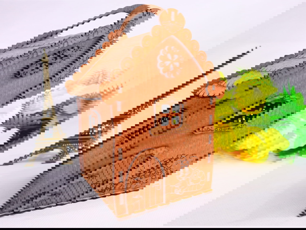 طرح جعبه کادویی به شکل خانه با دسته 3 میلی‌متری مناسب برای استفاده در دستگاه های cnc چوب و cnc لیزر - laser cut house shape gift box with handle 3mm cdr file