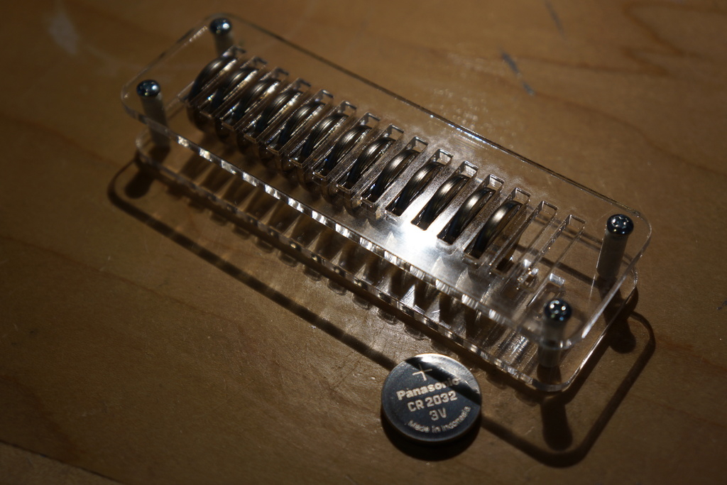 طرح جا سکه ای CR2032 مناسب برای استفاده در دستگاه های cnc چوب و cnc لیزر - laser cut cr2032 coin cell holder dxf file