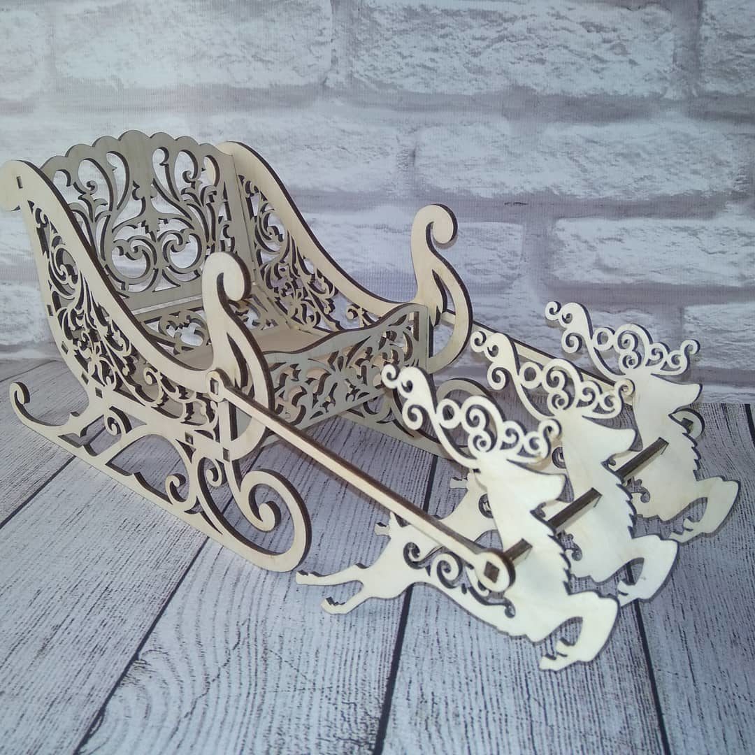 طرح سورتمه بابانوئل طرح گوزن شمالی برای تزئینات کریسمس داخل منزل مناسب برای استفاده در دستگاه های cnc چوب و cnc لیزر - laser cut santa sleigh reindeer indoor christmas decoration cdr file