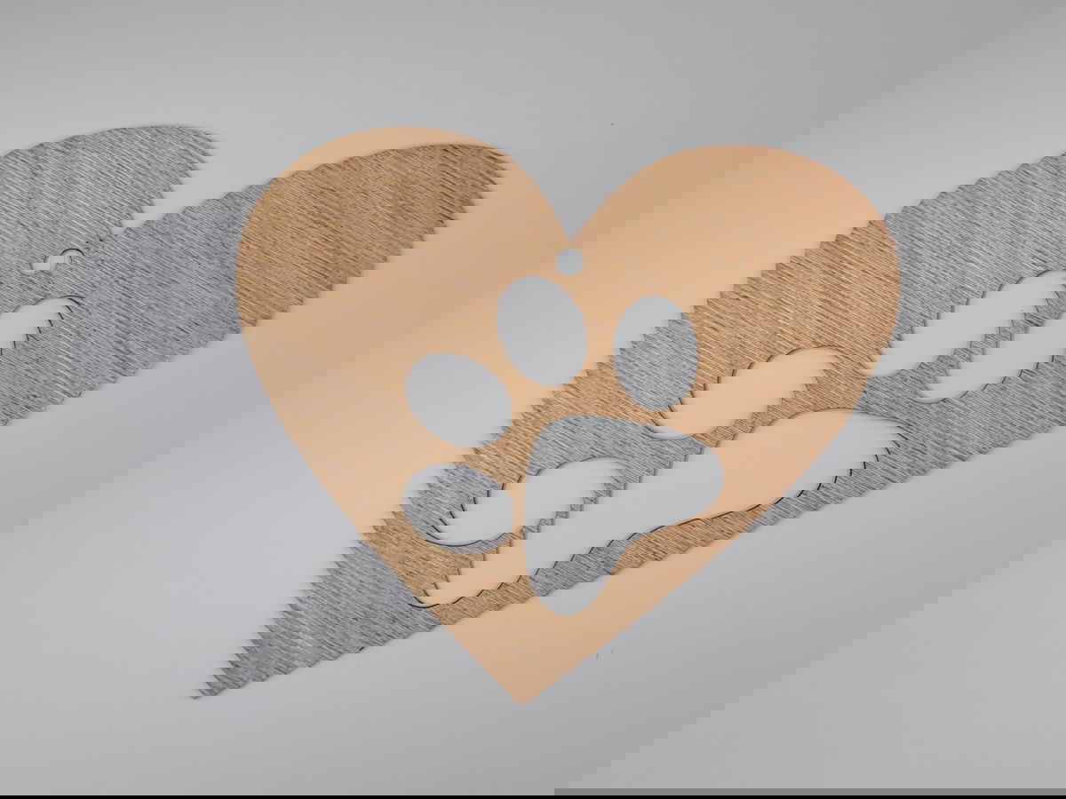 طرح قلب چوبی با پنجه برای تزیین درخت کریسمس مناسب برای استفاده در دستگاه های cnc چوب و cnc لیزر - laser cut wooden heart with paw christmas tree ornament cdr file