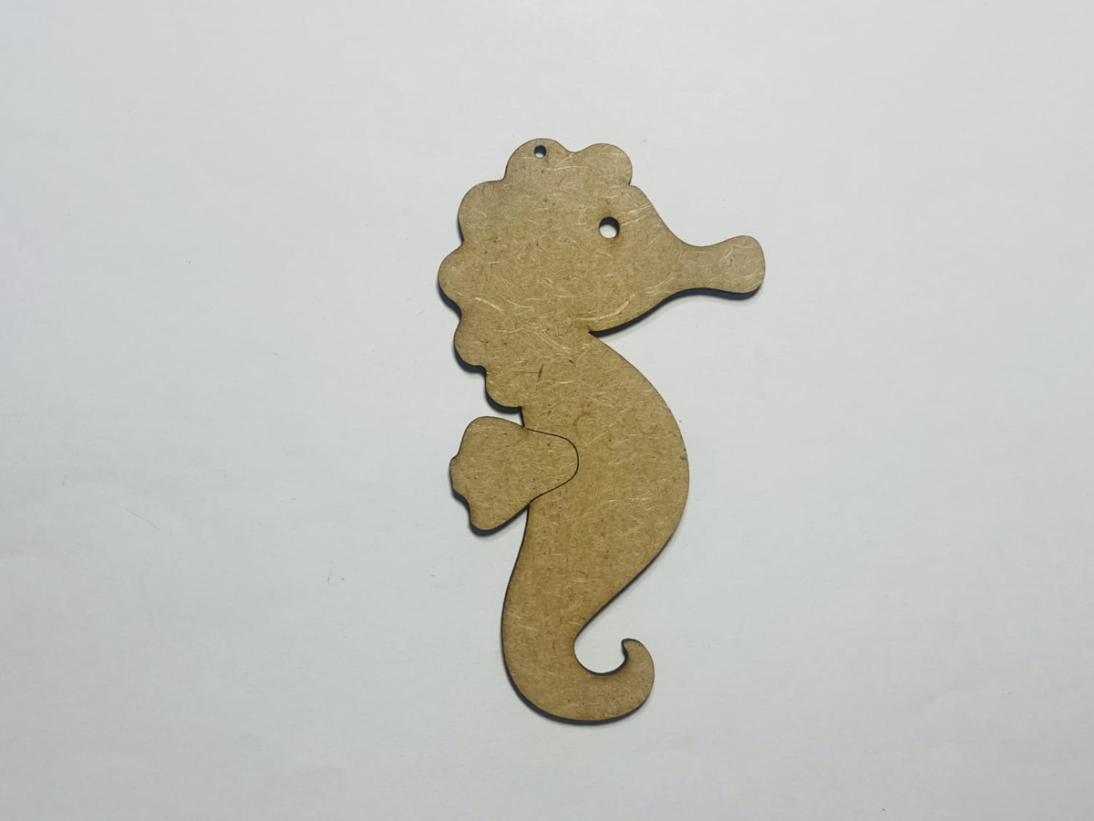 طرح اسب دریایی چوبی مناسب برای استفاده در دستگاه های cnc چوب و cnc لیزر - laser cut seahorse wood cutout shape cdr file