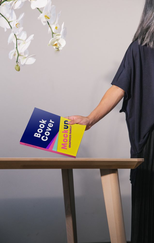 فایل ماکت جلد کتاب در دست - Book cover in hand mockup