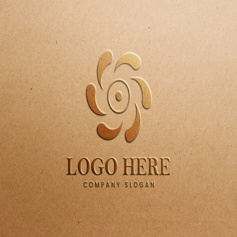 فایل ماکت لوگوی طلایی برجسته روی کاغذ کرافت - Embossed Gold Logo Mockup on Craft Paper